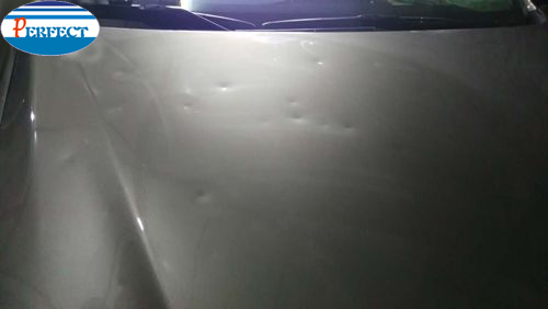 汽車冰雹坑修復(fù)前